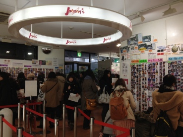 A very crowded shop that only sells photos of Japanese pop stars